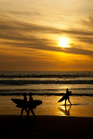 Surfers at Sunset