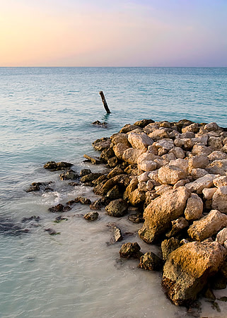 Sunset on a Mexican Coastline with a Rocky Shore