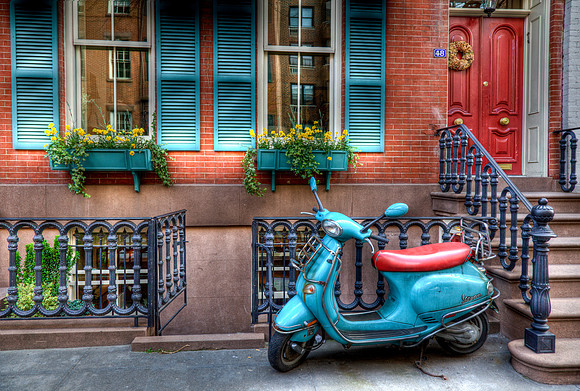 Vespa Scooter on New York City Sidewalk